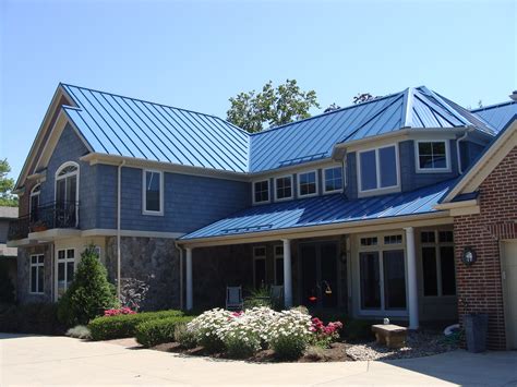 blue house with grey metal roof|blue metal roofing panels.